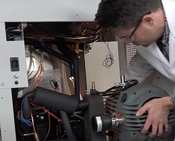 Labservco Employee Repairing Freeze Dryer